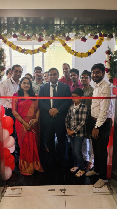 Cutting the ribbon at a new centre
